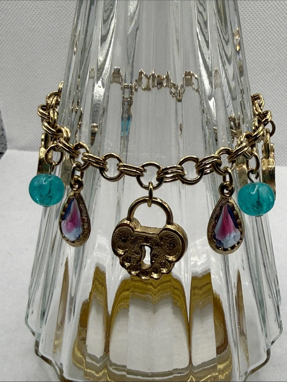 Whimsy Gold-Tone Charm Bracelet with Aqua Beads and Purple Teardrops lock & key
